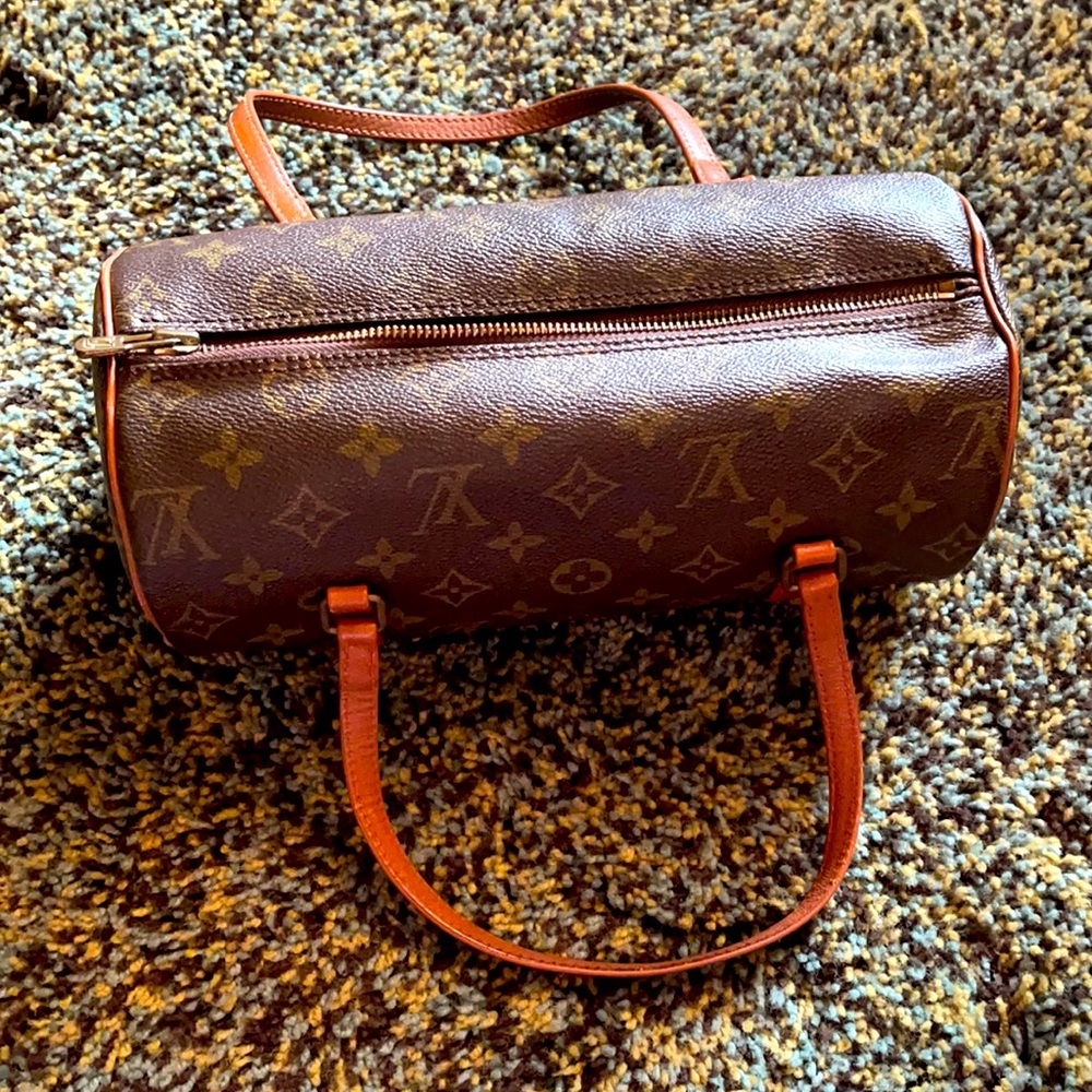Preowned Louis Vuitton Damier Papillon Roll bag.